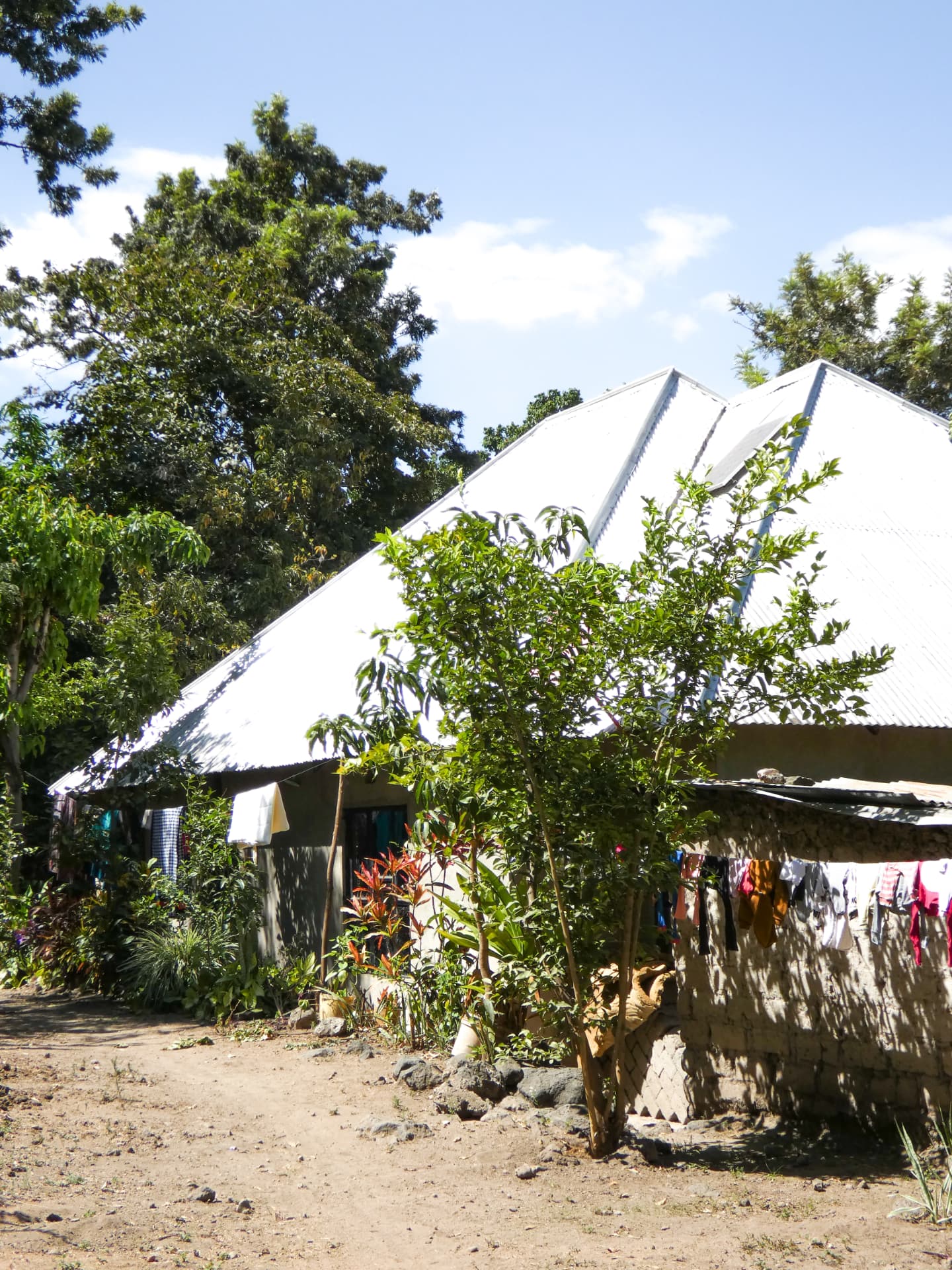 Traditional village house with a metal roof near Lake Manyara